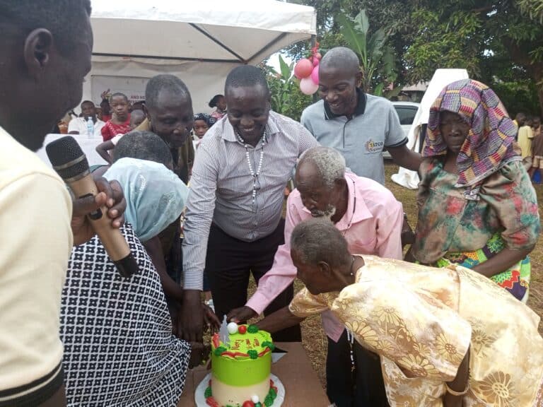 Elders celebrating with TATCO Uganda staff