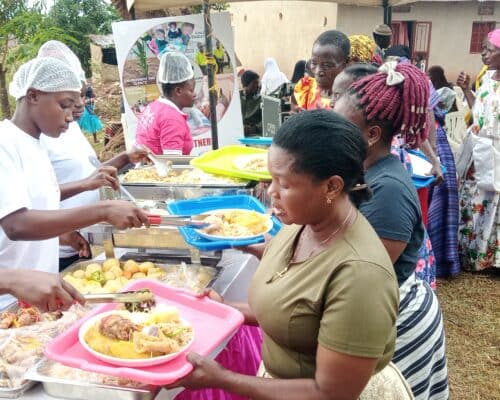 Women running an outside catering livelihood project