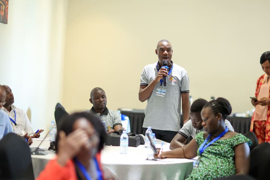 TATCO Uganda staff member speaking at a community workshop